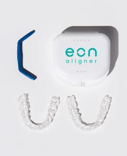 picture showing clear aligners, eon aligner case and aligner removal tool.